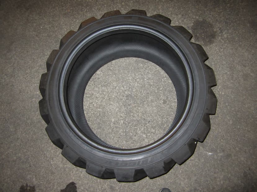 TIRE,LOW PROFILE 24.5X11.75